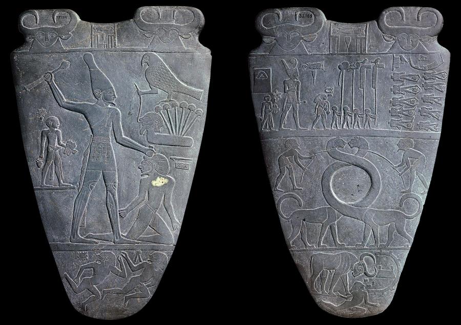 上图：主前31世纪古埃及那尔迈调色板（Narmer Palette）的正反面。调色板是用来研磨化妆品或颜料的，上面的图案描绘了那尔迈国王统一上下埃及。左图是正面，描绘那尔迈戴着上埃及王冠，右图是反面，那尔迈戴着下埃及王冠。两面的最下方都是被践踏的敌人，「以背为地，好像街市，任人经过」（赛五十一23）。